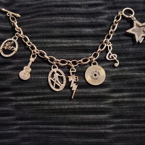 Source Unknown Gold Charm Bracelet with Musical and Star Details